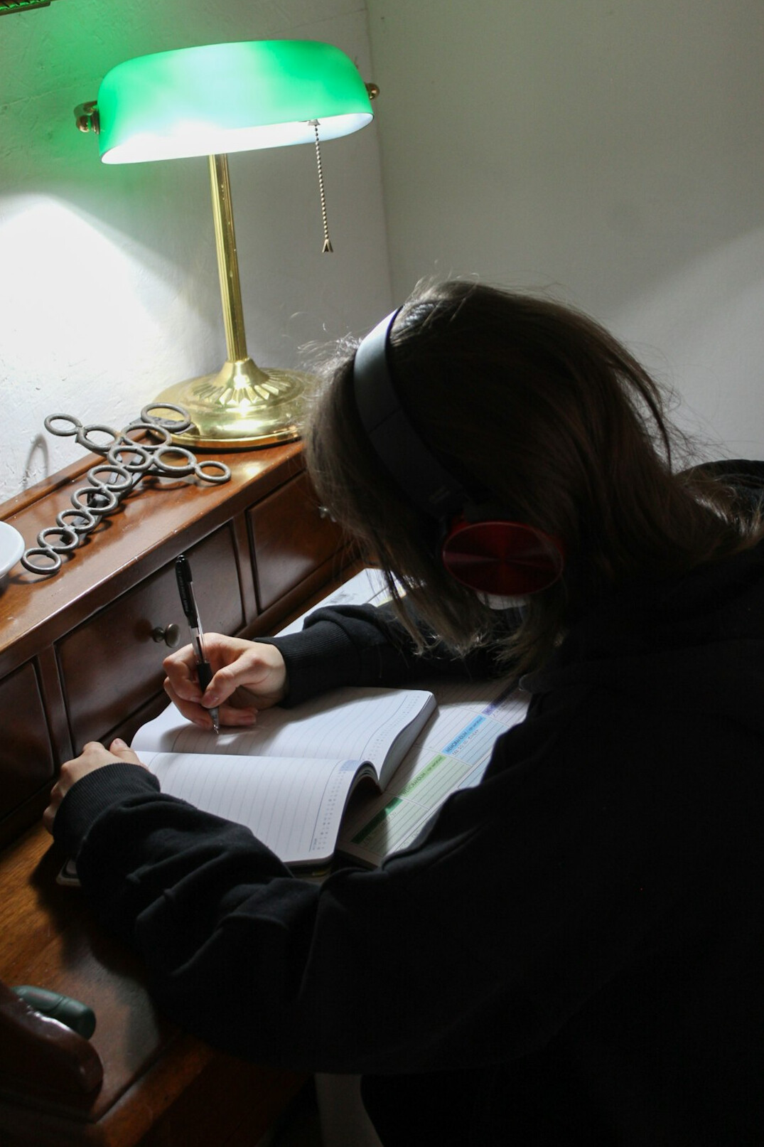 writer at desk with notebook